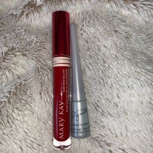 Mary may lip gloss and eyeliner.